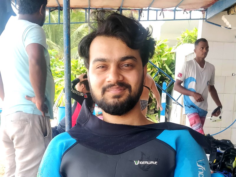 Jeet in wetsuit before a scuba dive